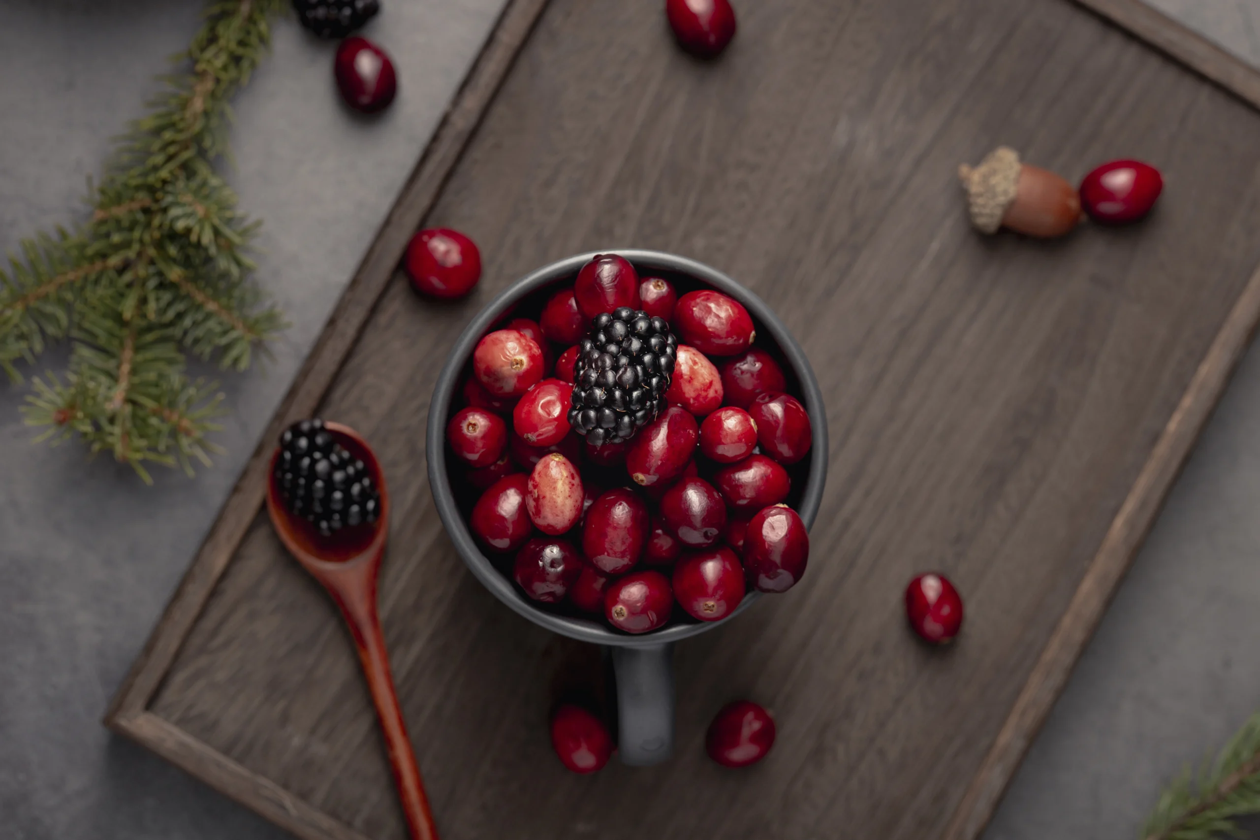 top-view-mug-with-cranberries-blackberries