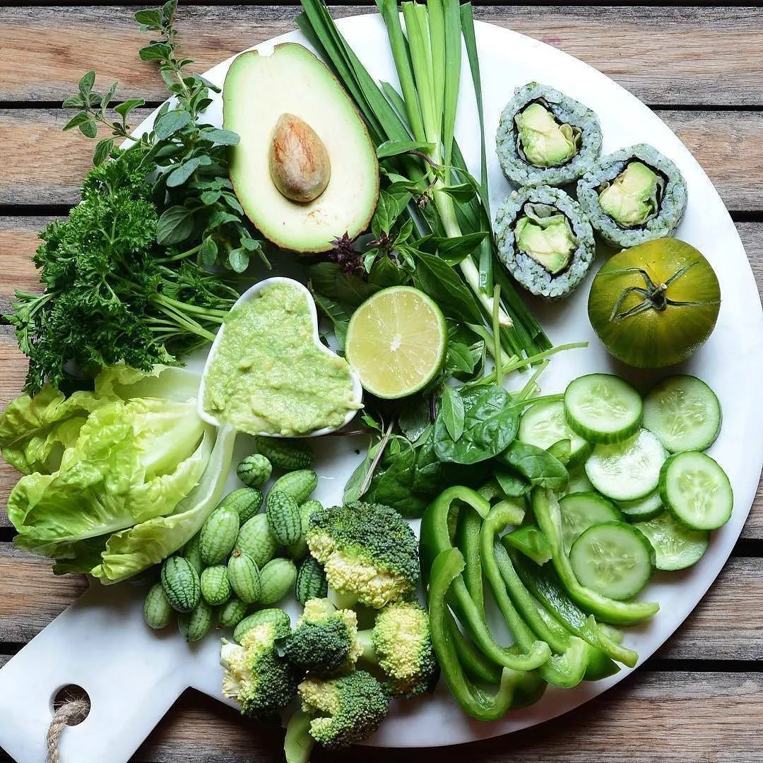 Seasonal veg spring assortment – fresh leafy greens, roots, and pods